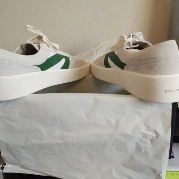 Fear of God Cream and Black Sneakers